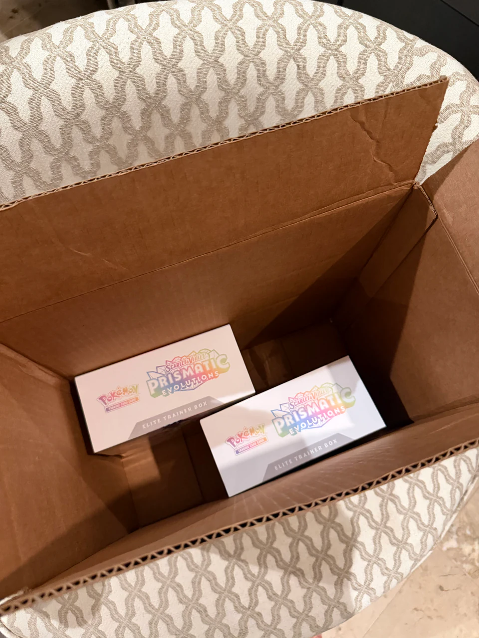 Pokémon Elite Trainer Boxes received in a cardboard box